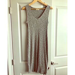 Everly body-con dress with slit in the front!